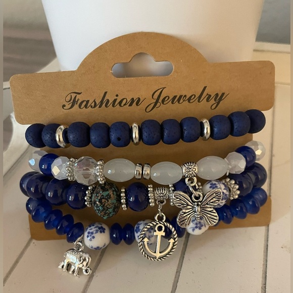 4 pack fashion bracelets with Anchor, Elephant and Butterfly Charm NWT - Picture 1 of 1